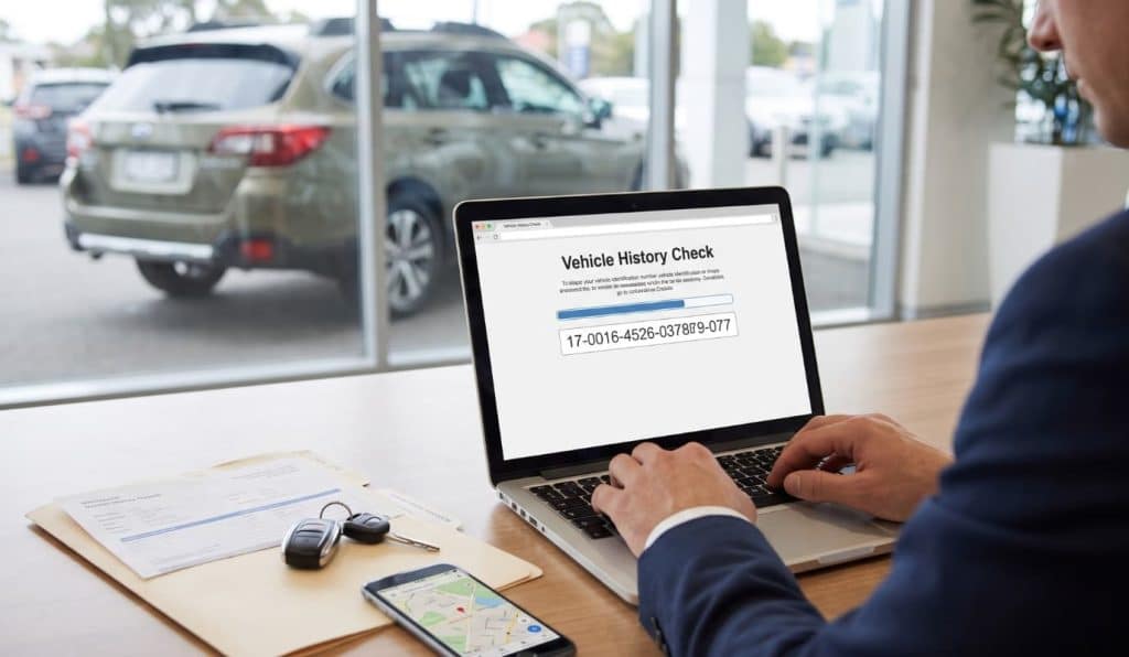 Buyer running a PPSR check before buying a used car in Australia